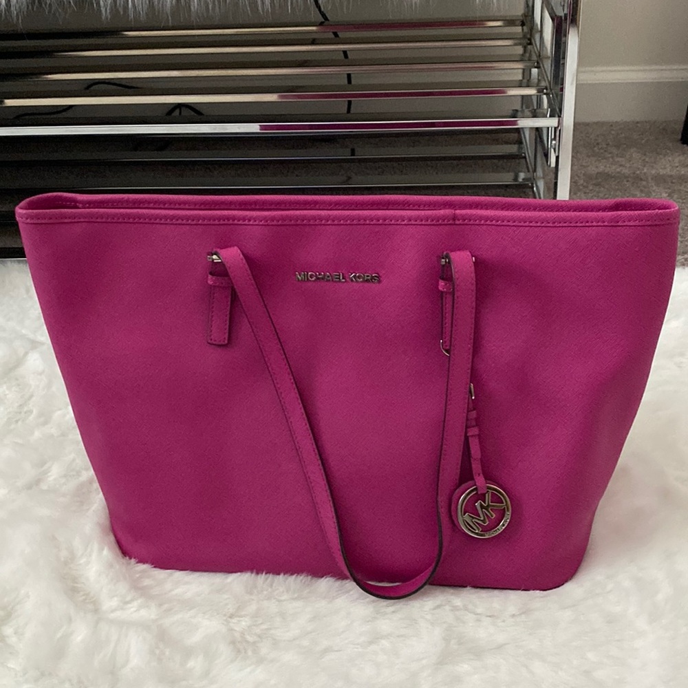 Michael Kors Tote,pockets inside, silver hardware, fuchsia, excellent condition